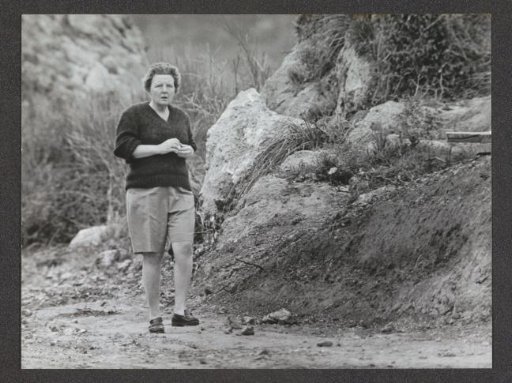 Queen Juliana Walking in Shorts Through an Italian Landscape