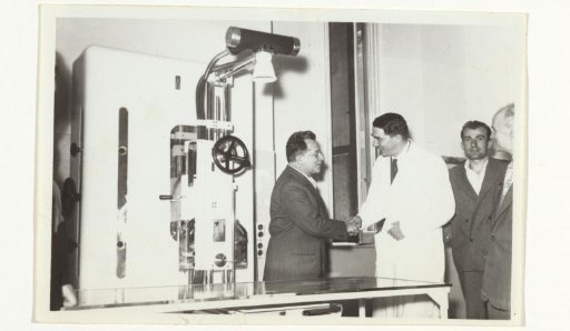 Palmiro Togliatti with surgeon Pietro Valdoni after donating medical equipment to a hospital in Rome