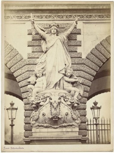 Sculpture on the facade of the Louvre in Paris