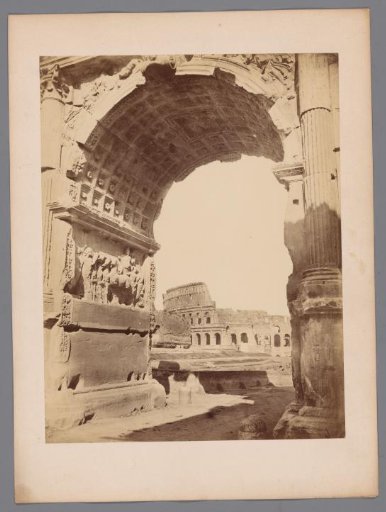 Colosseum seen through the Arch of Titus in Rome