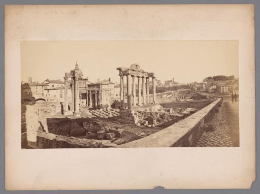 View of the Roman Forum in Rome with the remains of the Temple of Saturn in the foreground