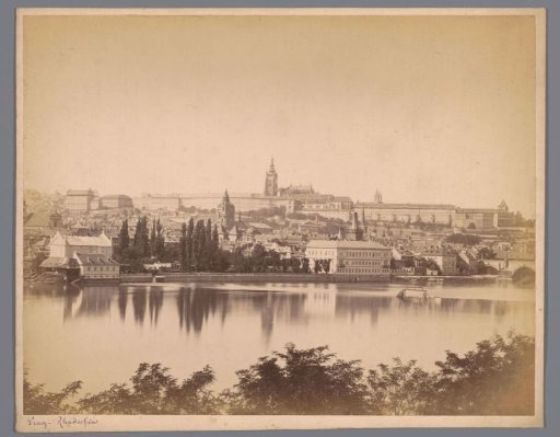 View of the Hradčany with the Prague Castle and St. Vitus Cathedral, in the foreground the Moldau