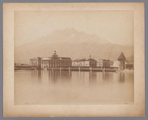 Buildings and the chapel bridge seen from Lake Lucerne at Lucerne, Switzerland