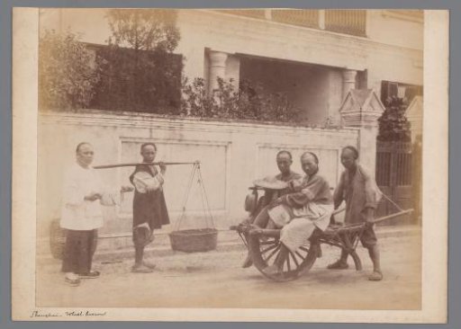 Five men with a wheelbarrow and carrying pole at Shanghai