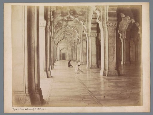 Two praying men inside the Moti Masjid of Agra Fort, Uttar Pradesh, India