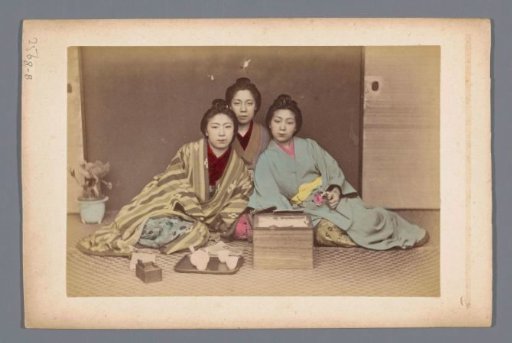Group portrait of three unknown Japanese women at tea
