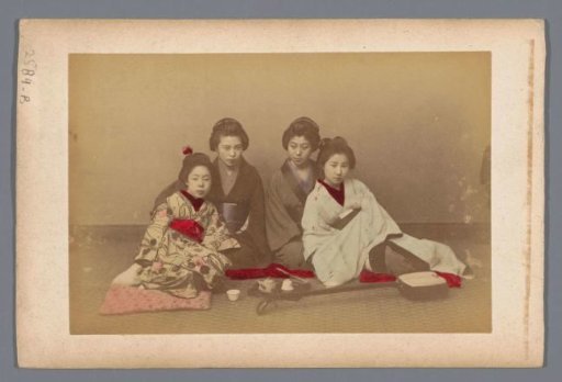 Group portrait of four unknown Japanese girls with tea and a shamisen