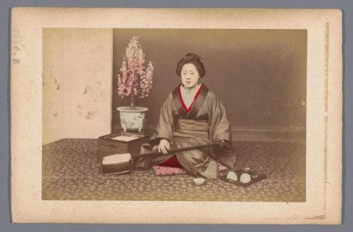 Portrait of an unknown Japanese woman with a shamisen