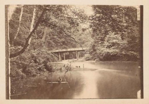View of a waterway with bridge in Japan
