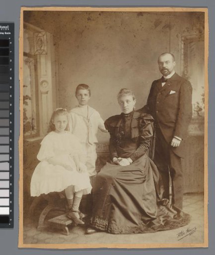 Portrait of an unknown married couple with two children