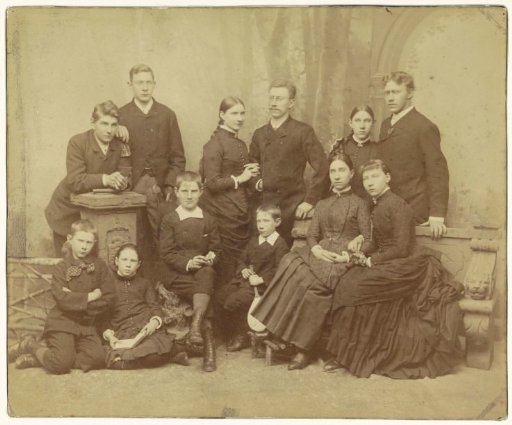 Group portrait of twelve children and young people