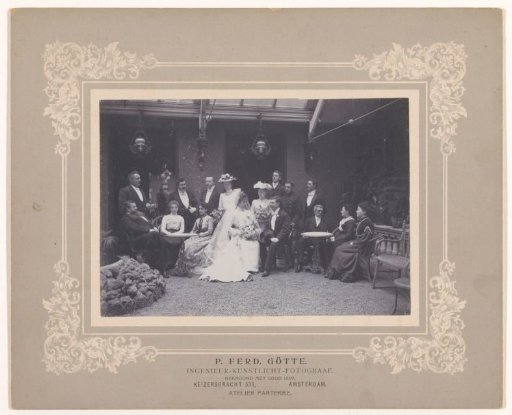 Group portrait with a bride and groom