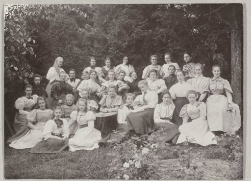 Group portrait of girls in a forest
