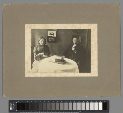 Portrait of L.H.F. Rontgen and his wife Christine van Wijngaard at a table