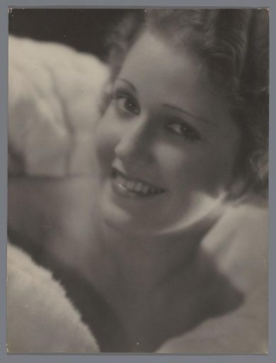 Portrait of an unknown woman in a fur coat, possibly an actress