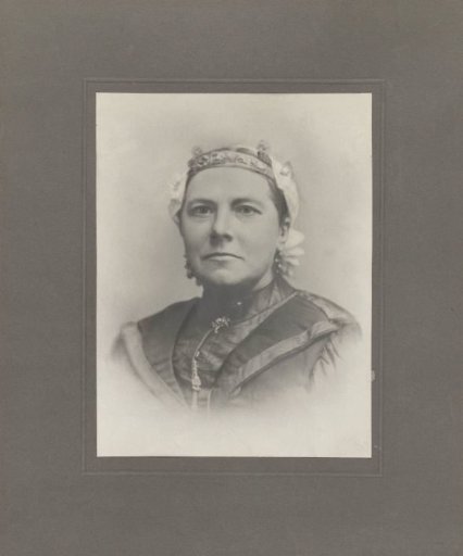 Portrait of a woman with a traditional costume cap