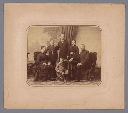 Family portrait of an unknown man, woman and four children