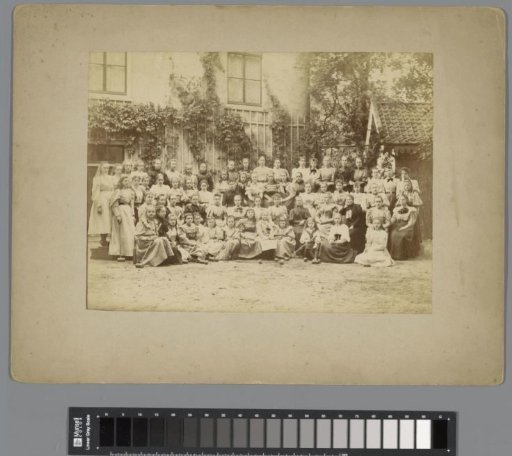 Group portrait of girls with teachers