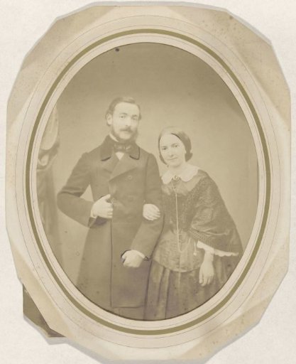 Studio portrait of a man and woman, standing