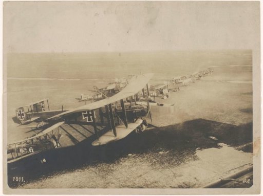 German and French fighter aircraft in a field