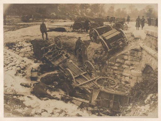 Wrecked horse-drawn wagons with German and Austro-Hungarian soldiers