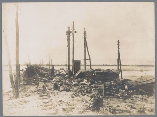 Austrian-Hungarian (?) soldiers at the site of a destroyed railway bridge