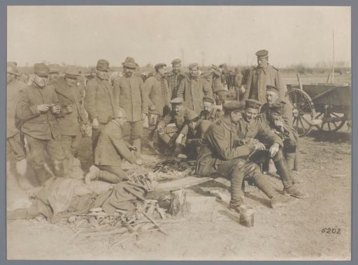 Soldiers resting in a field