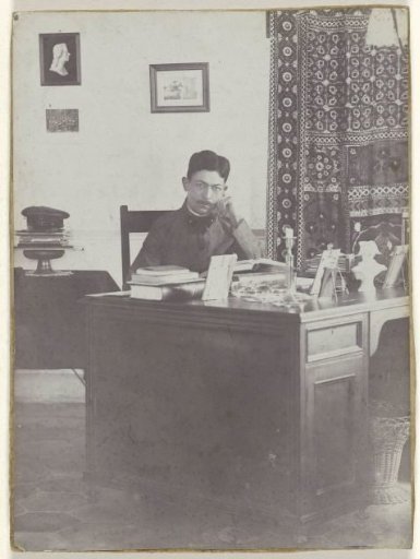 Portrait of an unknown man behind his desk, probably in the Dutch East Indies