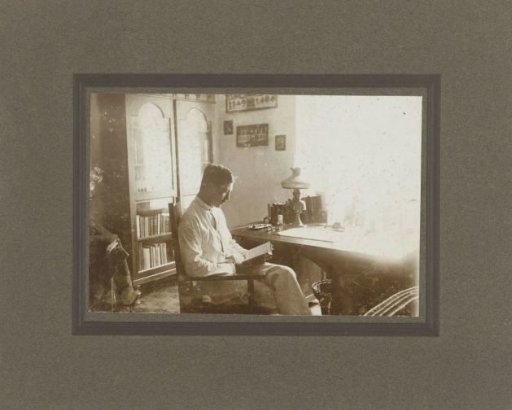 Portrait of an unknown man reading in a chair, Tanjung Pinang
