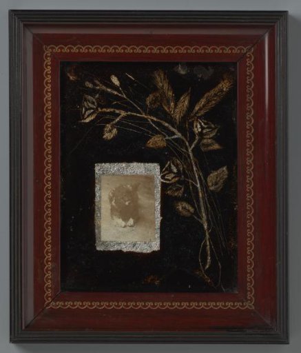 Recumbent Dog with Floral Decoration