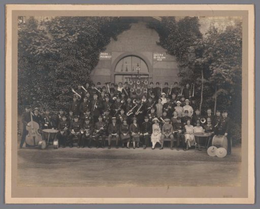 Group Portrait of the Amsterdamsche Postharmonie at the International Musikfest in Lucerne, Conductor Dirk Speets in the Center