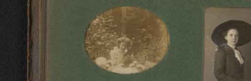 Willy Kersbergen with a cat in a garden