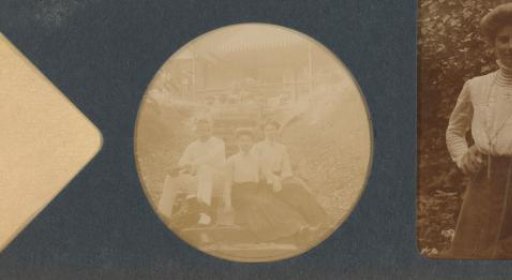 Group portrait of a young man, designated as Jan, with Tjuut and Jenny Hellendoorn beside him, possibly in Indonesia