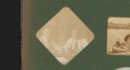 Double portrait of two young men at a table