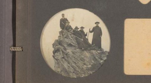 Group of men on a mountain peak, left: Jan Hellendoorn, Miel, and an unknown young man; right: three priests