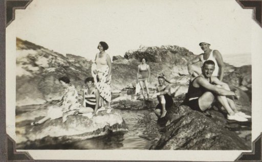 Group in swimwear on a rock at Roquebrune-Cap-Martin