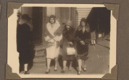Henriëtte Wassink with her daughters Wilhelmina and Dootje van Zijll de Jong walking on the street