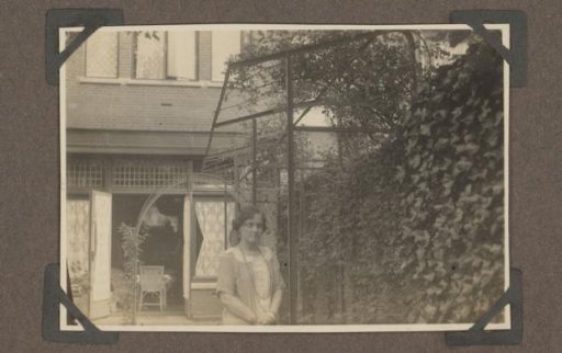 Henriëtte Wassink standing in a garden