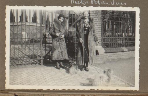 Henriëtte Wassink and Wilhelmina van Zijll de Jong with Dogs on the Street