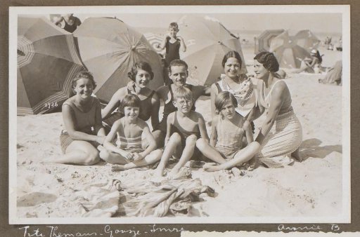 Group portrait of a party on the beach at Scheveningen