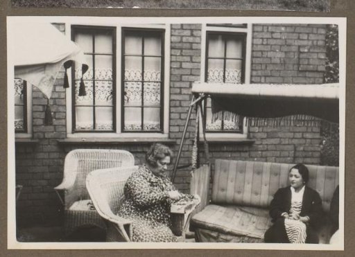 Wilhelmina van Zijll de Jong and another woman seated in a garden, London