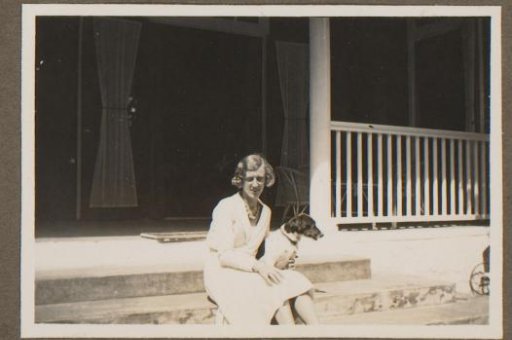 Portrait of Rie Olie-van den Brand with a dog