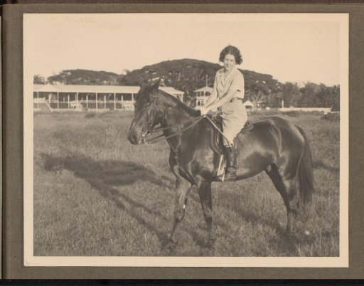 Portrait of a woman on horseback