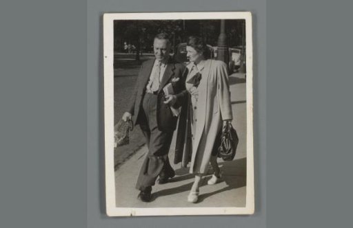 Portrait of an unknown man and woman walking on the street