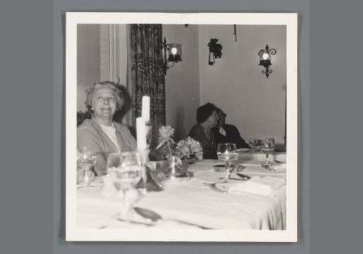 Older people sitting at a table