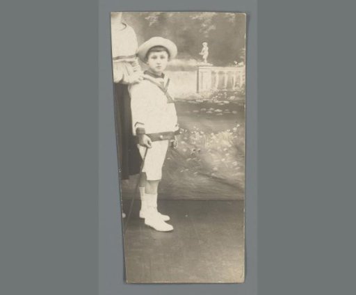 Portrait of an Unknown Boy in a Photography Studio