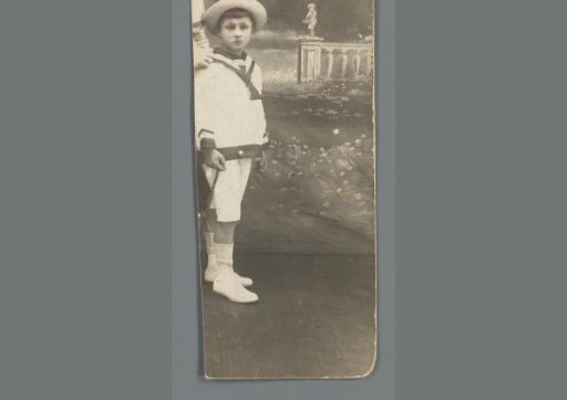 Portrait of an Unknown Boy in a Photography Studio