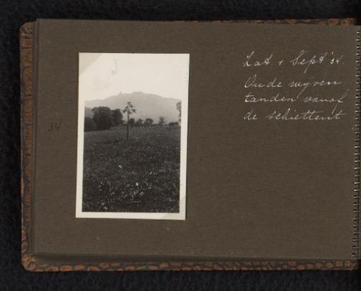 View of a meadow and the Denti della Vecchia, Ticino