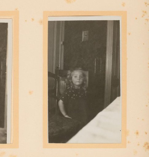 Portrait of a girl in front of a door