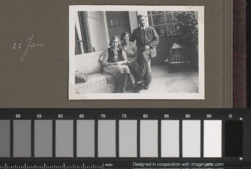 Portrait of three people, designated as the Streekstra family, on a sofa